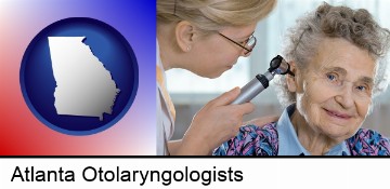 a otolaryngologist examining the ear of a patient in Atlanta, GA