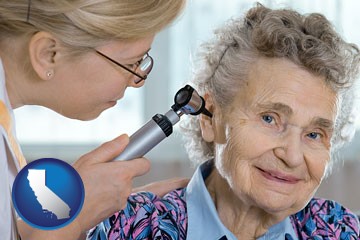 a otolaryngologist examining the ear of a patient - with California icon