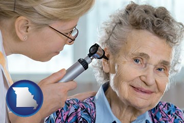 a otolaryngologist examining the ear of a patient - with Missouri icon